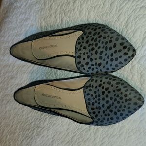 Gray flats with black spots
